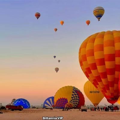 Hot air balloons over Luxor at sunrise