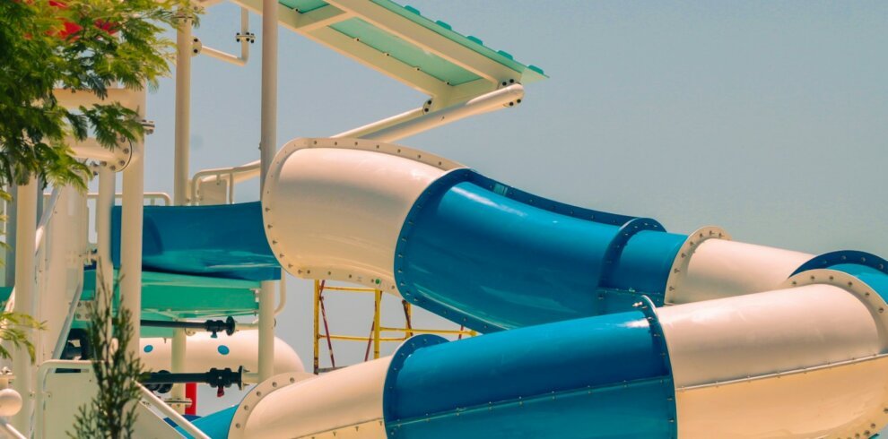 Blue and white water slides at a water park