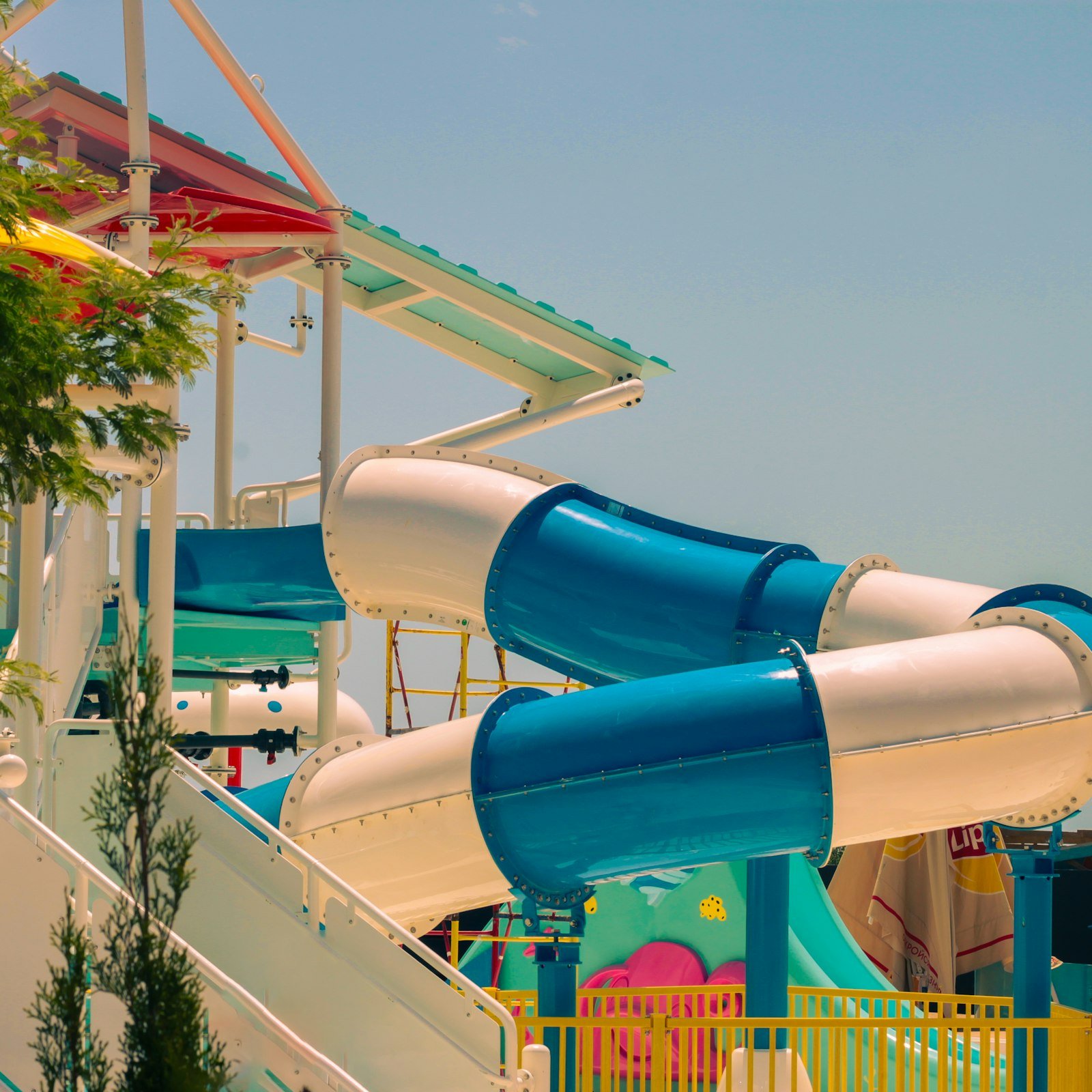 Blue and white water slides at a water park