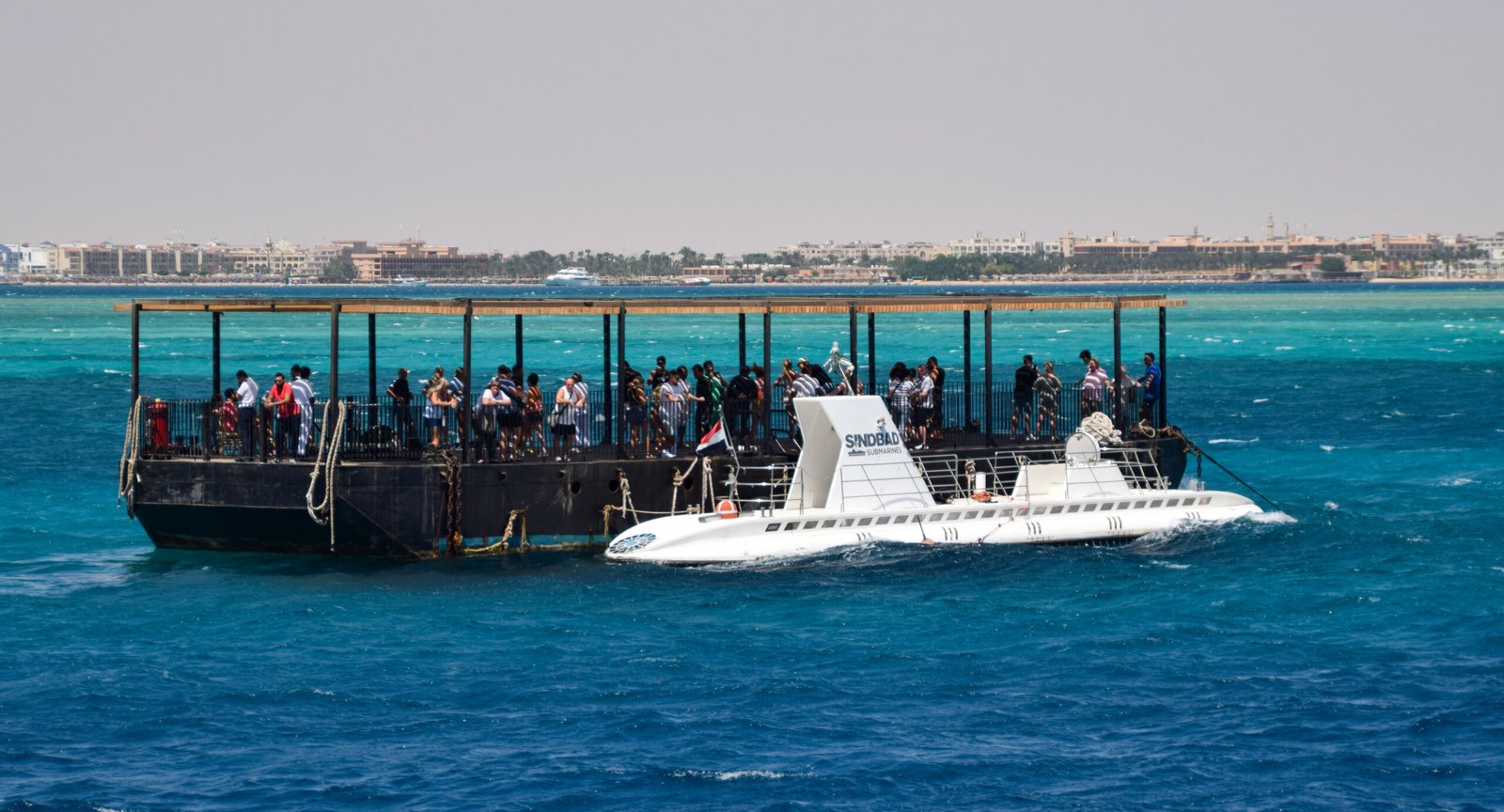 Tourist submarine at its floating boarding platform in Hurghada