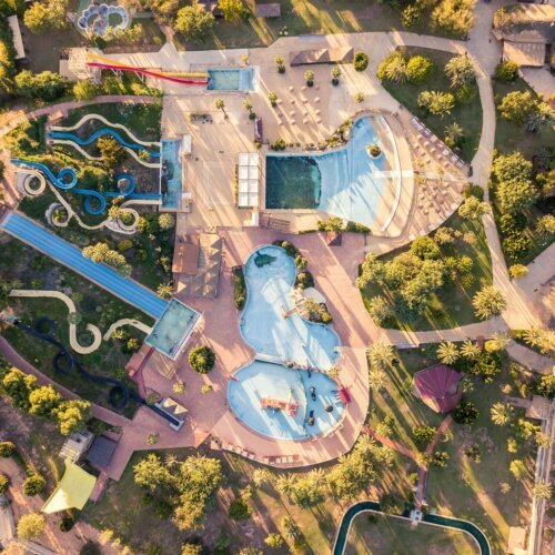 Aerial view of a water park with slides and pools