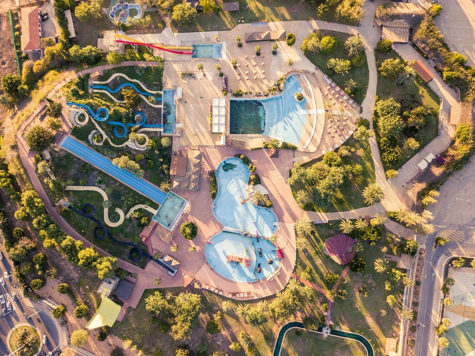 Aerial view of a water park with slides and pools